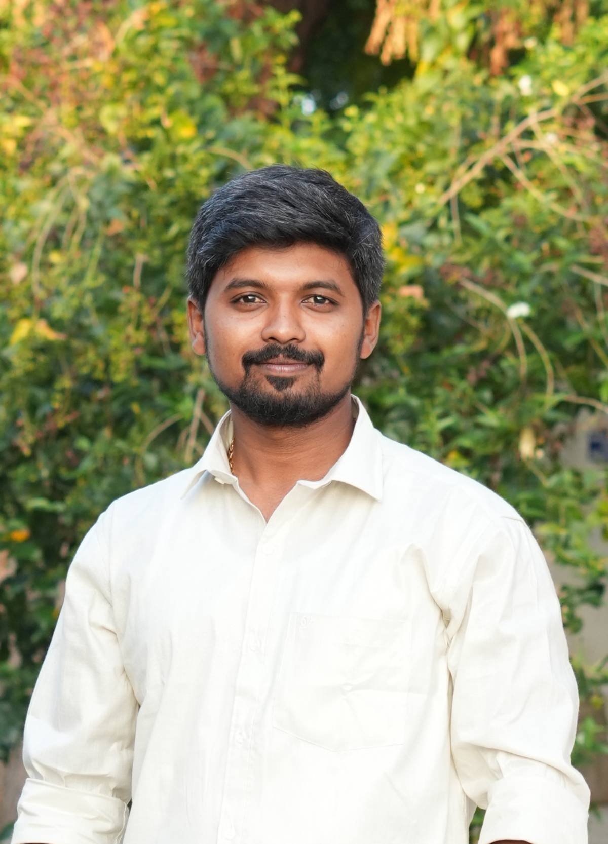 Selvam J